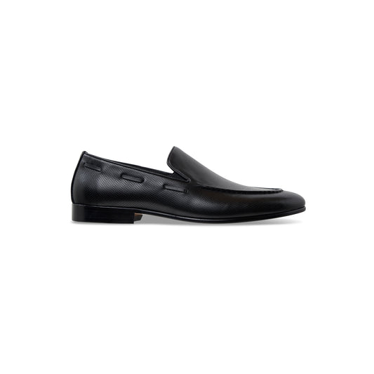 side view of a single pair of Milan Loafers in Black